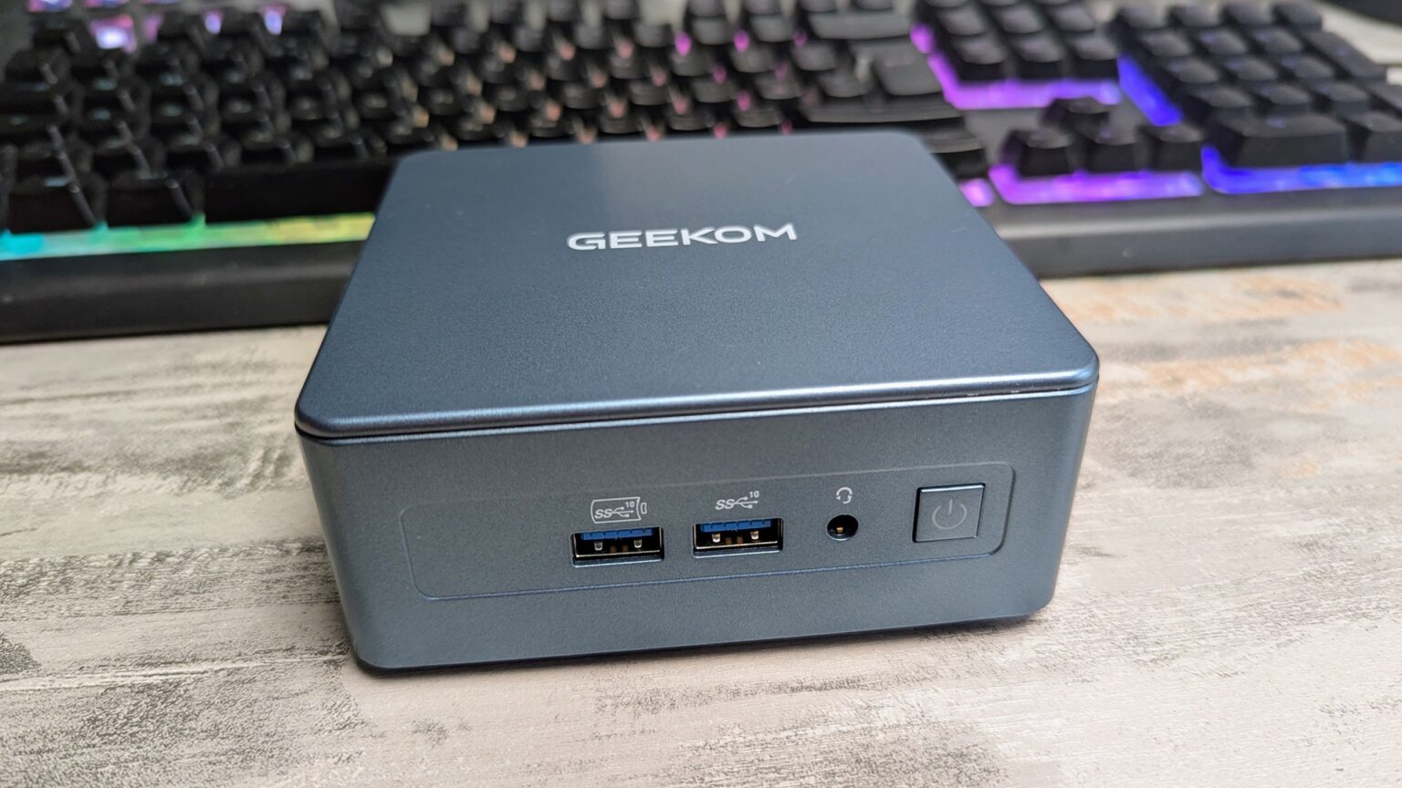 On the front of the office mini PC are two USB 3.2 Gen 2 ports, a 3.5mm ...