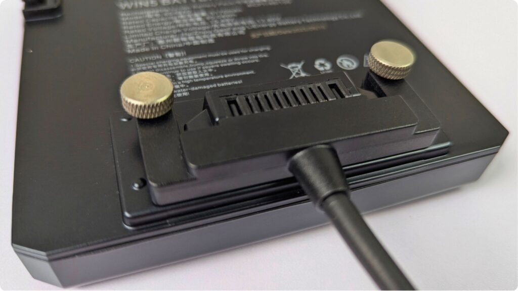 The battery screwed in and connected