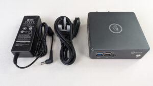 A Mini PC and power supply (Yours may differ)