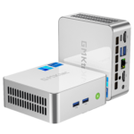 The image displays the GMKTEC M3 Mini PC, a compact and efficient computing device. It features a sleek, modern design with a matte black finish. The front panel includes multiple ports for connectivity, such as USB ports and an audio jack, and the GMKTEC logo is visible on the top surface. The design emphasizes portability and functionality, suitable for various computing needs.