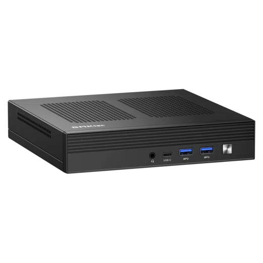 The image shows the GMKTEC NUBOX M4 Mini PC a compact and stylish computing device The mini PC has a sleek matte black finish with a minimalist design The front panel features multiple inputoutput ports including USB ports an audio jack and possibly a power button The GMKTEC logo is prominently displayed on the top surface The devices small form factor highlights its portability and practicality for various computing needs