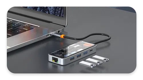 The DroiX NT8 Hub being connected to a laptop, showcasing it's extreme functionality and additional connectivity offered. Making it a needed laptop accessory.