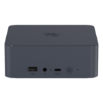 The front view of a compact Beelink EQI12 Mini PC in dark grey. It features a USB-A port, a 3.5mm headphone jack, a USB-C port, and a power button. The casing has a textured design on the top with a circular logo.