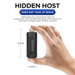 A close up of the GD10 PLUS gaming stick held between fingers to demonstrate its compact size With dimensions of 95cm by 34cm the image highlights its lightweight and space saving design ideal for portable gaming anywhere