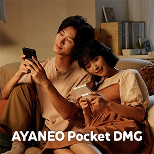 A cozy scene of a couple relaxing and using Pocket DMG devices