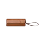 AYANEO Micro Protective Leather Case in brown featuring a compact cylindrical design with a fold over flap secured by a magnetic closure The case has a wrist strap attached for easy carrying and the AYANEO logo is embossed on the front Designed to provide stylish and durable protection for AYANEO Pocket Micro devices