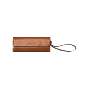 AYANEO Micro Protective Leather Case in brown, featuring a compact, cylindrical design with a fold-over flap secured by a magnetic closure. The case has a wrist strap attached for easy carrying, and the 'AYANEO' logo is embossed on the front. Designed to provide stylish and durable protection for AYANEO Pocket Micro devices.