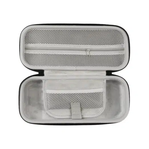 Interior view of the AYN Odin 2 and Portal carrying case, showcasing a soft, protective lining with mesh pockets and a zipper compartment for storing accessories.