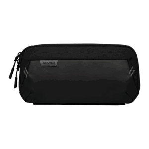 A horizontal, black carrying case for a handheld gaming device is shown against a plain grey background. The case has a textured top half and a smooth, matte bottom half. A small, dark grey patch with "AYANEO" in white text is stitched onto the front. The case has two zippers and two diagonal reflective stripes on either side of the front panel.