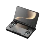 An angled open view of a light grey AYN Thor handheld gaming console with a clamshell design against a dark featureless background The top screen is open displaying a soft golden abstract image The bottom half of the device shows the controls including a black D pad black analog sticks and face buttons in red blue green and yellow resembling the classic black controller aesthetic Both the top and bottom screens are reflective mirroring the golden light