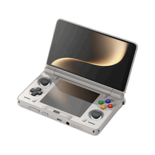 An angled open view of a light grey AYN Thor handheld gaming console with a clamshell design against a dark featureless background The top screen is open displaying a soft golden abstract image The bottom half of the device shows the controls including a black D pad black analog sticks and face buttons in red blue green and yellow resembling the classic rainbow controller aesthetic Both the top and bottom screens are reflective mirroring the golden light