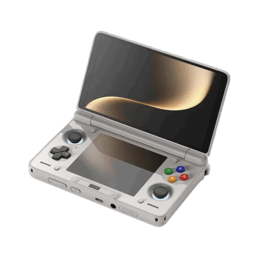 An angled open view of a light grey AYN Thor handheld gaming console with a clamshell design against a dark featureless background The top screen is open displaying a soft golden abstract image The bottom half of the device shows the controls including a black D pad black analog sticks and face buttons in red blue green and yellow resembling the classic rainbow controller aesthetic Both the top and bottom screens are reflective mirroring the golden light