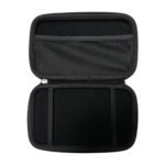 A top down shot of the black hard shell case for the GPD MicroPC 2 opened to reveal its interior The top half of the case has a mesh pocket while the bottom half is empty with two elastic straps meant to hold the device