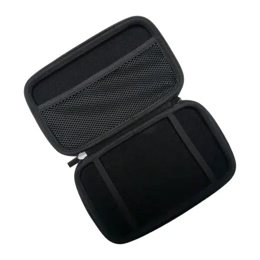 A top-down, angled shot of the black hard shell case for the GPD MicroPC 2, opened to reveal its interior. The top half of the case has a mesh pocket for accessories, while the bottom half has two elastic straps to securely hold the device. The case is empty.