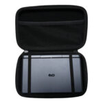 A top down shot of the open black hard shell case for the GPD MicroPC 2 A grey GPD MicroPC 2 is secured inside the bottom half with two black elastic straps The top half of the case has a mesh pocket The front of the MicroPC 2 is facing upwards showing the GPD logo