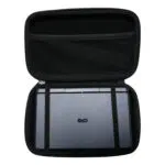 A top down shot of the open black hard shell case for the GPD MicroPC 2 A grey GPD MicroPC 2 is secured inside the bottom half with two black elastic straps The top half of the case has a mesh pocket The front of the MicroPC 2 is facing upwards showing the GPD logo