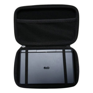 A top-down shot of the open, black hard shell case for the GPD MicroPC 2. A grey GPD MicroPC 2 is secured inside the bottom half with two black elastic straps. The top half of the case has a mesh pocket. The front of the MicroPC 2 is facing upwards, showing the "GPD" logo.