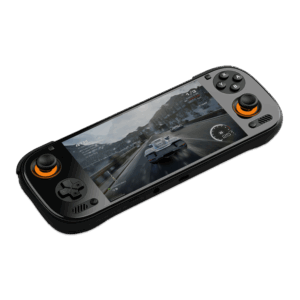 An angled shot of a black AYN Odin3 handheld gaming console against a dark background. The screen displays a realistic racing game scene with a car on a mountain road. The console features a D-pad and an analog stick on the left, and face buttons and an analog stick on the right. Both analog sticks are illuminated with a bright orange glow