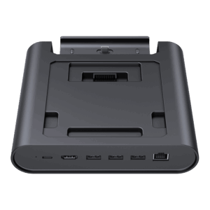A three-quarter frontal view of a black GPD WIN 5 docking station, isolated against a black background. The dock features an array of ports on the front edge, including USB-C, USB-A, and an RJ45 Ethernet port. The recessed top area is designed to hold the GPD WIN 5 and includes a connector for charging and data.