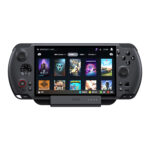 A direct frontal view of the black GPD WIN 5 handheld console resting securely in its dock The screen displays a video game library interface Steam OS style with various game covers like Destiny 2 Overwatch 2 and Apex The docks prominent GPD logo and LED indicators are visible beneath the console