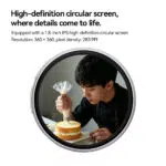 Close up of a circular smart badge featuring a high definition IPS screen The screen displays a clear detailed image of a person meticulously decorating a cake with frosting Text above specifies a 18 inch screen size $360 times 360$ resolution and 283 PPI