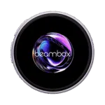 A circular badge or display framed by a light purplelavender colored metal ring The black display area shows a highly reflective swirling purple and NIKKO BADGE TS SLIVER IMAGE 1png A circular badge or display framed by a silver metal ring The black display area shows a highly reflective swirling purple and blue abstract orb with the white text beambox overlaid near the bottom The image is set against a dark green backgroundabstract orb with the white text beambox overlaid near the bottom The image is set against a dark green background