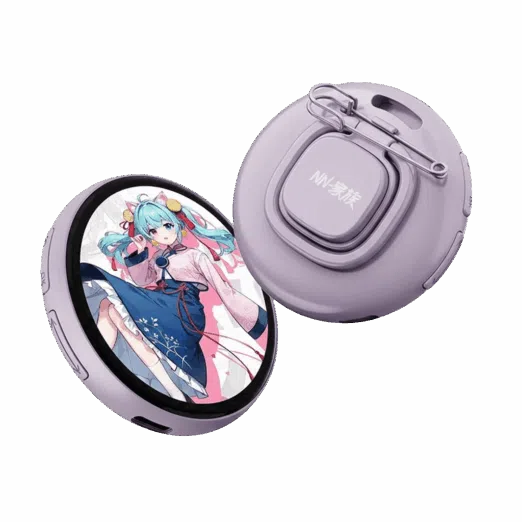 Two circular digital smart badges in a light lavender purple color The front badge features a round LCD screen displaying an anime style girl with blue hair in a pink and blue outfit The rear badge shows the back casing with a safety pin attachment a lanyard hole and the text NN 家族 on a central square button