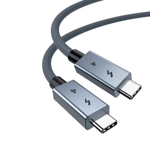 A close up of a high quality USB 4 cable featuring two USB C connectors with space grey metallic housings The connectors are engraved with a lightning bolt icon and the number 4 The cable itself has a durable grey braided nylon jacket shown curved against a plain white background