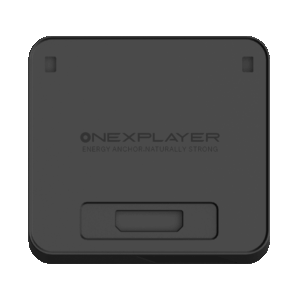 A top-down view of the ONEXPLAYER APEX Battery Dock, a square-shaped, matte black electronic accessory with rounded corners. The center of the device features the embossed ONEXPLAYER logo, followed by the slogan "ENERGY ANCHOR, NATURALLY STRONG". There are two small rectangular indentations near the top corners and a larger, recessed rectangular port or connection area located at the bottom center of the face.