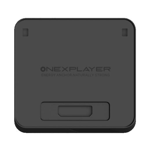A top down view of the ONEXPLAYER APEX Battery Dock a square shaped matte black electronic accessory with rounded corners The center of the device features the embossed ONEXPLAYER logo followed by the slogan ENERGY ANCHOR NATURALLY STRONG There are two small rectangular indentations near the top corners and a larger recessed rectangular port or connection area located at the bottom center of the face