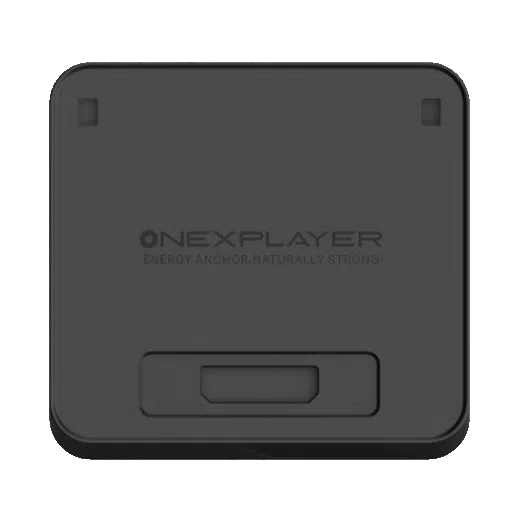 A top down view of the ONEXPLAYER APEX Battery Dock a square shaped matte black electronic accessory with rounded corners The center of the device features the embossed ONEXPLAYER logo followed by the slogan ENERGY ANCHOR NATURALLY STRONG There are two small rectangular indentations near the top corners and a larger recessed rectangular port or connection area located at the bottom center of the face