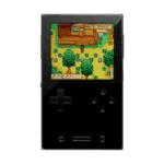 AYANEO-POCKET-VERT-BLACK-LISTING-DONE-01 A front-facing view of the AYANEO Pocket DMG handheld gaming console in black. It features a vertical orientation with a large square screen displaying a pixel-art farming game. Below the screen is a classic D-pad on the left, four action buttons on the right, and three small navigation buttons at the bottom.