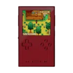 AYANEO-POCKET-VERT-RED-LISTING-DONE-01 A front-facing view of the AYANEO Pocket DMG in a deep metallic red. The vertical device shows a bright screen with gameplay from Stardew Valley. The D-pad and action buttons are finished in the same red color as the body, giving it a uniform, premium look.