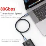 Focus 80Gbps Data Speed Visual Top down view of the cable connecting a laptop to an external hard driveSSD Key Info Large red text reading 80Gbps and the claim that it can transfer a 15GB file in about 1 second