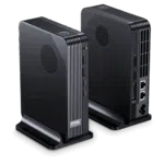 A three-quarter product shot of two identical, black, compact GPD-branded eGPU or docking stations standing in their own bases against a dark background. The unit on the left shows the textured front and a side edge featuring two USB ports and the "GPD" logo. The unit on the right shows the textured back panel, which is densely packed with connectivity ports including Oculink, a power socket, an HDMI port, multiple USB ports, two Ethernet ports, and an audio jack, highlighting its comprehensive input and output capabilities.