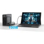 The GPD G2 eGPU enclosure connected to a 2-in-1 tablet PC via USB4, providing 100W Power Delivery charging while simultaneously expanding graphical performance for high-end gaming and AI workloads.