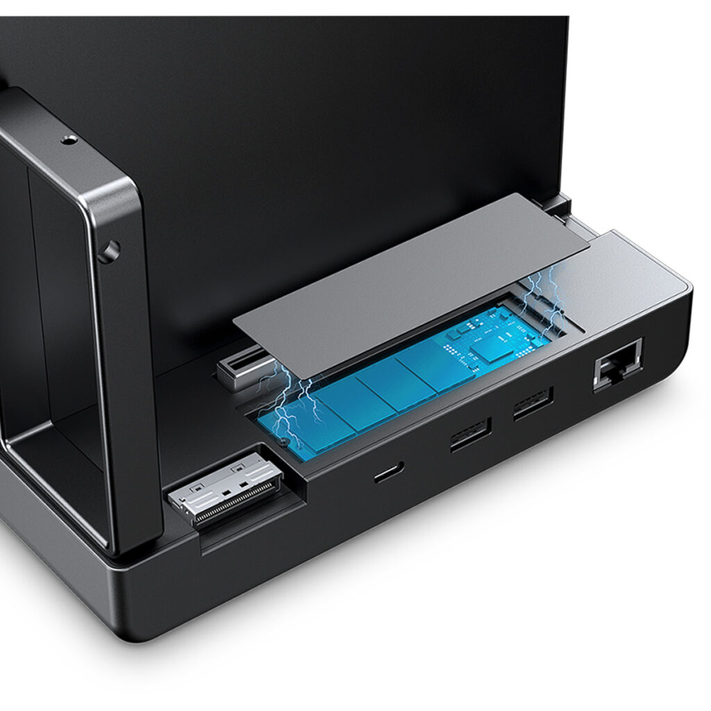 GPD G2 3 Close-up of the GPD G2 docking station base showing the integrated NVMe M.2 2280 SSD slot with a magnetic cover, surrounded by USB4 v2.0, USB Type-A, and Ethernet ports.
