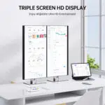 Triple display workstation setup showing a silver GMKtec G10 Mini PC driving two vertical monitors and an adjacent tablet display simultaneously at 4K resolution at 60Hz.