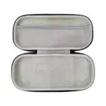 Open interior view of the empty MANGMI Pocket Max Carrying Case on a white background, highlighting the soft, protective light-gray plush lining, a molded bottom compartment, and a large zippered mesh storage pocket on the upper lid for accessories.