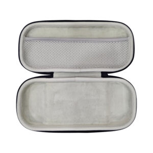 Open interior view of the empty MANGMI Pocket Max Carrying Case on a white background, highlighting the soft, protective light-gray plush lining, a molded bottom compartment, and a large zippered mesh storage pocket on the upper lid for accessories.