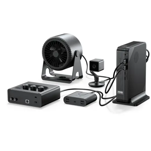 GPD BOX black Mini PC standing upright, front angled view with ribbed texture, cables to fan, camera, hub and control box