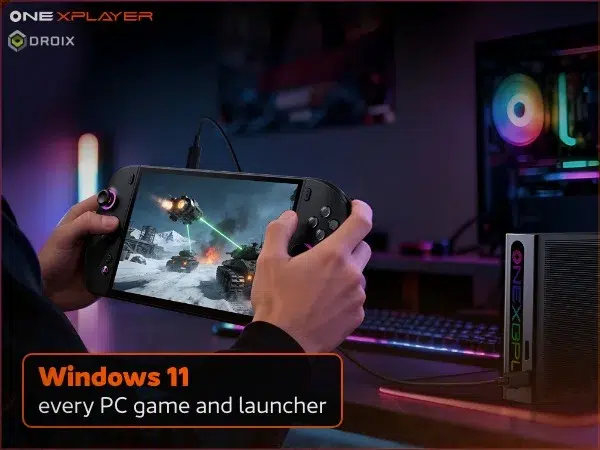 Black OneXPlayer 3 handheld gaming PC on a desk connected over USB4 to a OneXGPU external GPU dock